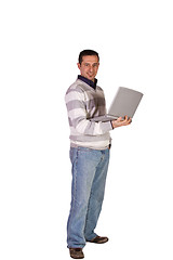 Image showing Businessman Posing with his Laptop