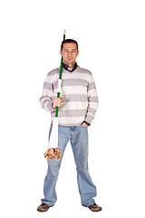 Image showing Casual Man Posing with a Sweeper