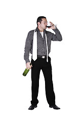 Image showing Businessman celebrating with a glass of drink 