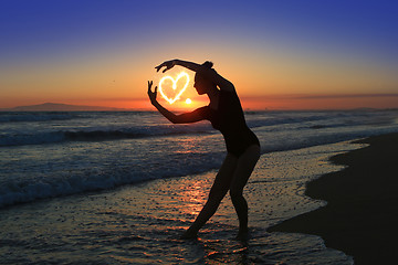 Image showing Skilled Young Dancer at the Beach During Sunset