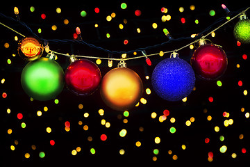 Image showing Christmas balls and lights on the Christmas background with boke