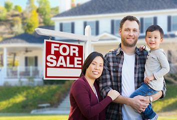 Image showing Mixed Race Chinese and Caucasian Parents and Child In Front of H