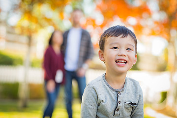 Image showing Outdoor Portrait of Happy Mixed Race Chinese and Caucasian Paren