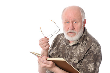 Image showing Senior man reading a book, isolated on white