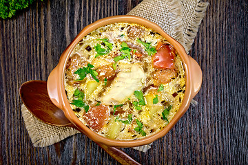 Image showing Soup fish with vegetables and cream on board top