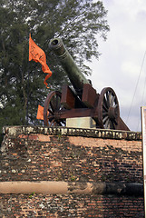 Image showing Wall, flag and gun