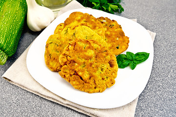 Image showing Flapjack chickpeas with zucchini in plate on granite table