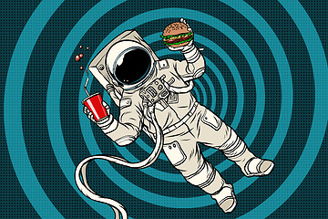 Image showing Astronaut in zero gravity with fast food