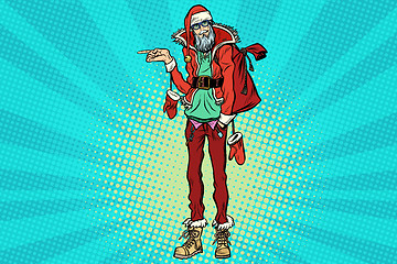 Image showing Hipster Santa Claus pointing sideways