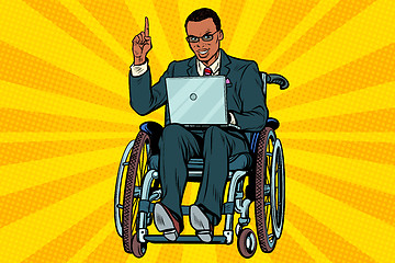 Image showing African businessman in wheelchair with laptop