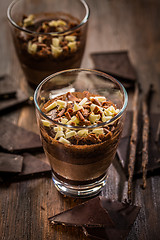 Image showing Layered chocolate dessert in a glass