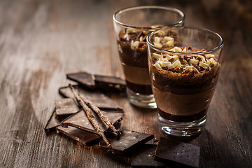 Image showing Layered chocolate dessert in a glass