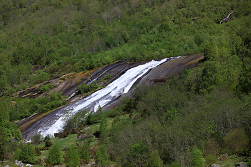 Image showing The snow melting creates streams along the mountainside west of 