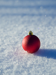 Image showing christmas balls decoration in snow