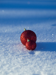 Image showing christmas balls decoration in snow