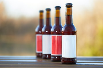 Image showing Beer bottles on a table