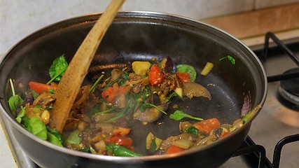 Image showing Preparing hot breakfast