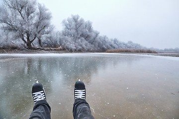 Image showing Skating on a lake