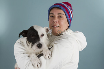 Image showing Woman with her little dog. 