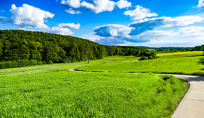 Image showing Country lane with blue sky