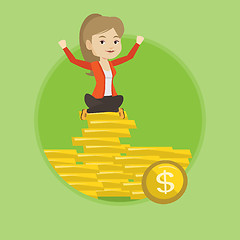 Image showing Happy business woman sitting on golden coins.