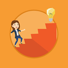 Image showing Business woman walking upstairs to the idea bulb.