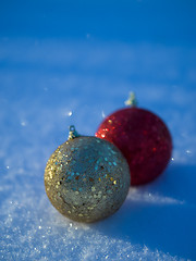 Image showing christmas balls decoration in snow