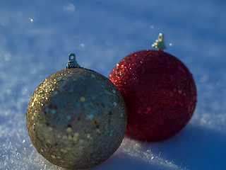 Image showing christmas balls decoration in snow