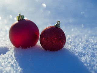 Image showing christmas balls decoration in snow