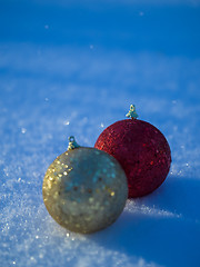 Image showing christmas balls decoration in snow