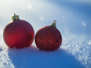 Image showing christmas balls decoration in snow