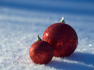 Image showing christmas balls decoration in snow