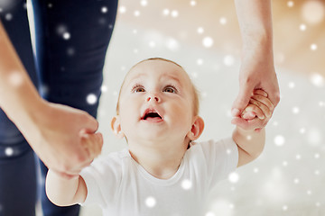 Image showing happy baby learning to walk with mother help