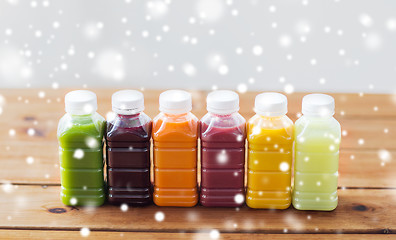 Image showing bottles with different fruit or vegetable juices