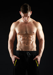 Image showing young man or bodybuilder with bare torso