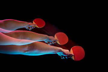 Image showing The table tennis player serving