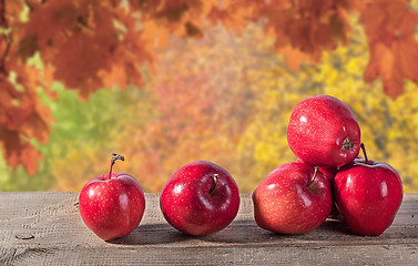 Image showing Red apples on a wooden table