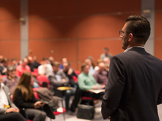 Image showing Public speaker giving talk at Business Event.