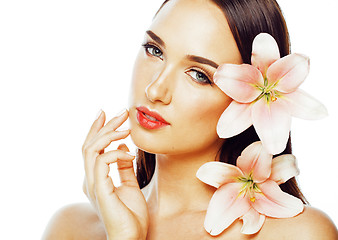 Image showing young attractive lady close up with hands on face isolated flower lily