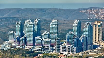 Image showing Istanbul, Turkey - April 3, 2017: Skyscrapers in the Maslak. Shooting through the glass. Retro style.