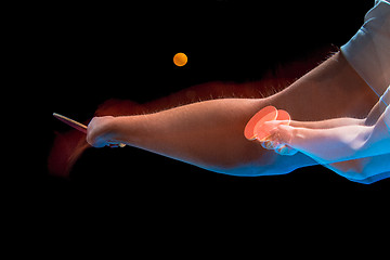 Image showing The table tennis player serving