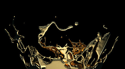 Image showing Liquid gold or oil splatter and splashes isolated on black