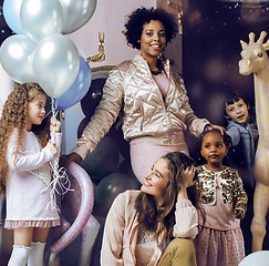 Image showing Lifestyle and people concept: young pretty diversity nations woman with different age children celebrating on birth day party together happy smiling, making selfie. African-american, asian and caucasi