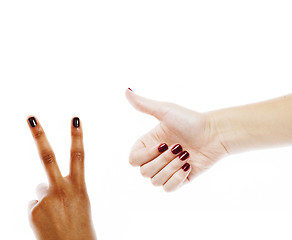 Image showing two different nathion manicured hands on white isolated