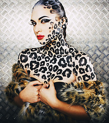 Image showing young sexy woman with leopard make up all over body, cat bodyart closeup, depression