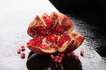 Image showing Pomegranate On A Glass Background