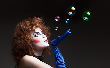 Image showing Woman mime with soap bubbles.