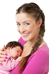 Image showing Mother holding newborn baby in arms