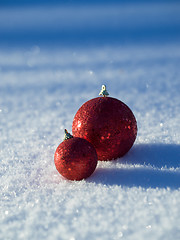 Image showing christmas balls decoration in snow