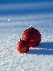 Image showing christmas balls decoration in snow